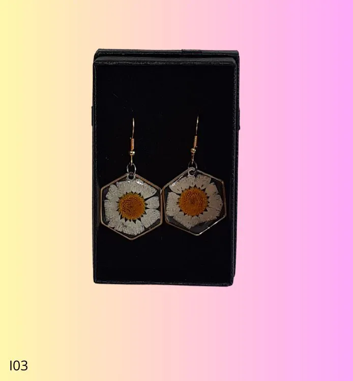 Boucles d'oreilles hexagonales marguerite blanche