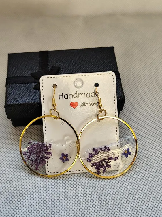 Boucle d'oreilles créole violette